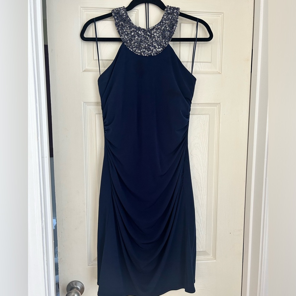 Halter beaded evening dress.